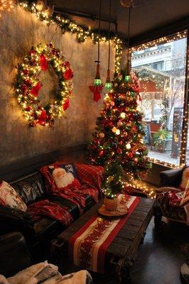 Cozy couches and decked-out trees are perfect for lounging with friends and a Hot Toddy on a chilly New York evening!