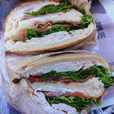 #13. Turkey Club 13.99 yummy club sandwich with lots of turkey and crispy bacon, lettuce, tomato, mayo, sliced in the middle