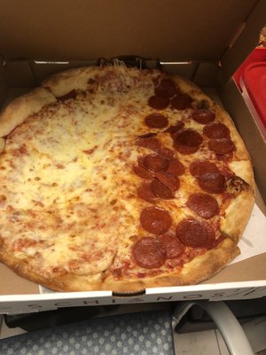 Half extra cheese and less than half pepperoni