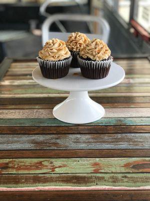 Giant Chocolate Cupcake with Peanut butter buttercream and caramel drizzle.