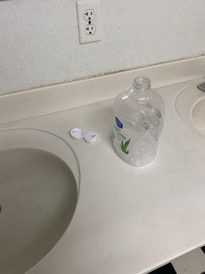 Soap container filled with water