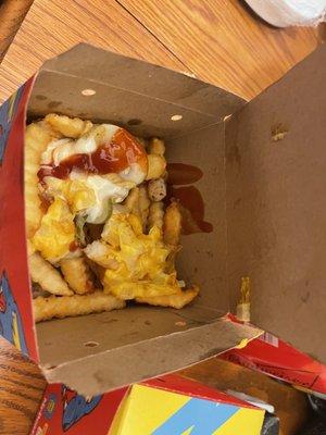 Beast fries... there were chunks of grilled chicken in there for some reason, but certainly didn't help this mess