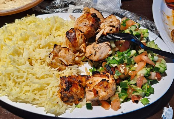 Chicken kabob, rice, and salad.