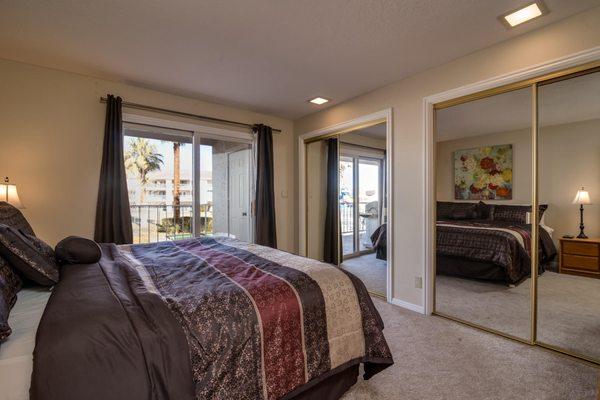 A king bed occupies one of the 3 bedrooms of the Robbins Nest Retreat at Las Palmas