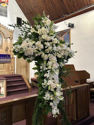 Cross funeral arrangement