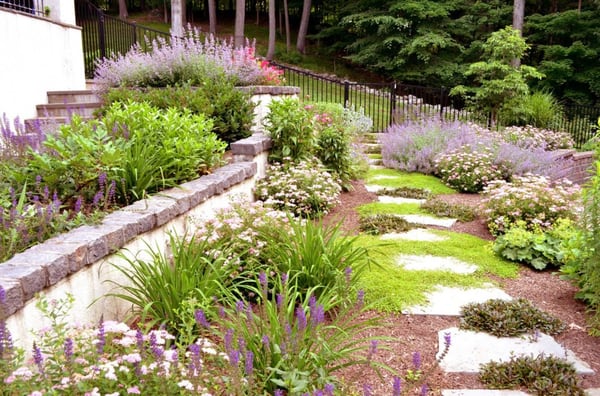 Stunning floral beds line the pathways surrounding your dream property.  We can make it happen.