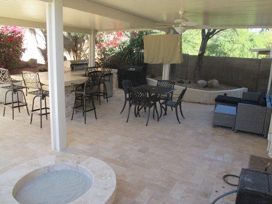 Designed and installed patio cover, BBQ, Firepit and mounted TV and fan for this outdoor kitchen retreat.