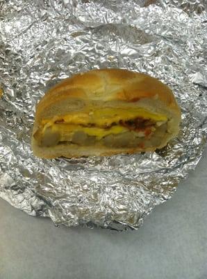 Bacon, egg, cheese and potato on a roll