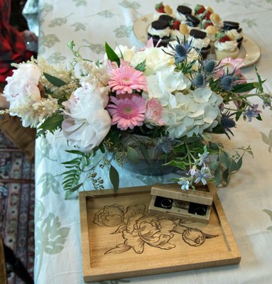 A dozen Cookies and Cream and Strawberry Shortcake cupcakes for a small covid-era wedding ceremony