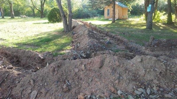 The two trenches that were dug in my yard by Kurtz company and have been here for the last month