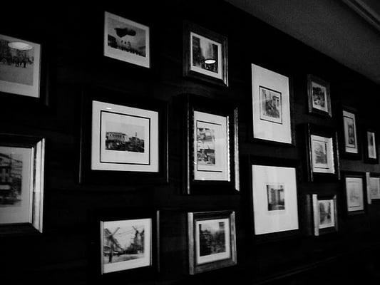 Old San Francisco pictures on the wall of the bar