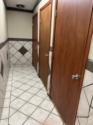 Row of individual shower stalls