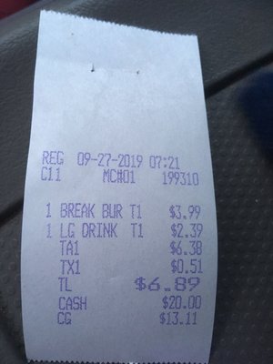 Receipt for 1 breakfast burrito and a large sweet tea.