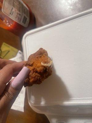 Hair poking out of my chicken wing.