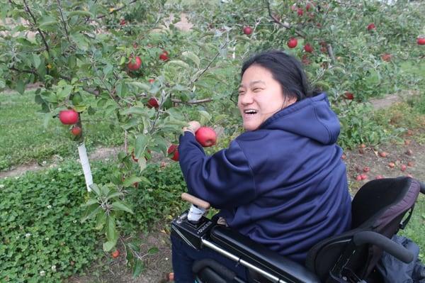 Me apple picking from my wheelchair!