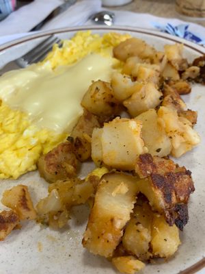 Home fries and cheese eggs