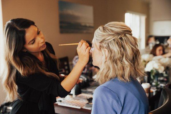 Stephy doing my mom's makeup for the wedding.