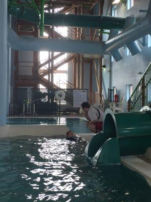 Lifeguard Jake helping my son practice floating