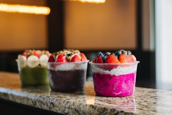 Pitaya bowl, Acai Bowl, and a Matcha bowl inside