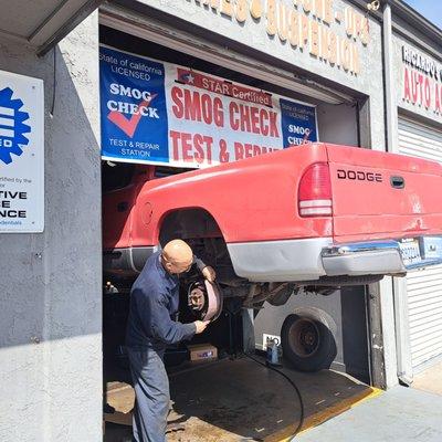 Mechanic doing rear brake job