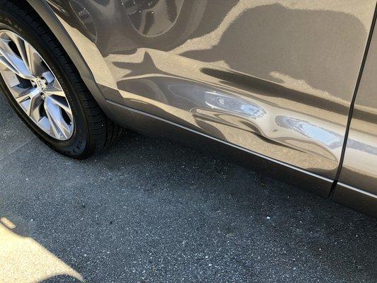 Toyota Highlander rear door-Extreme Dent @ Bottom of Door