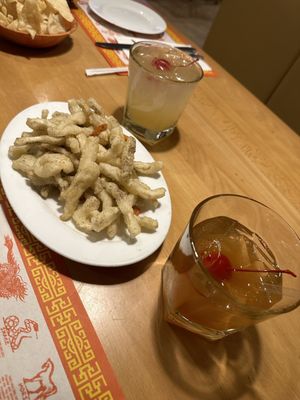 Salt and pepper calamari, mai tai and a white Mai tai (lot of pineapple)