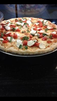 Mozzarella Caprese pizza.