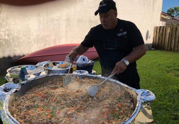 The chef cooking up some yummy Polynesian Fried Rice!