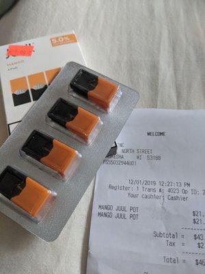 COUNTERFEIT JUUL PODS - orange caps instead of Juul's orange yellow caps. liquid should be clear, not dark orange