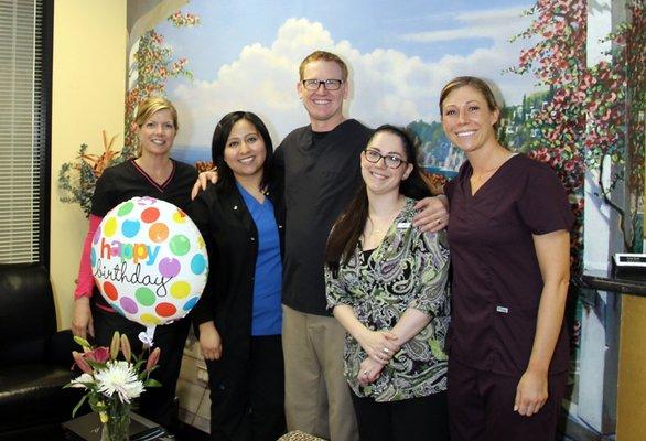 Dr. Francis with some of his staff.