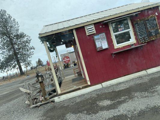 The cute shop with seating in the back