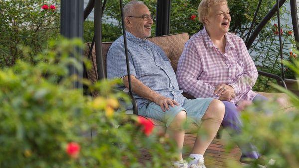 Couple Enjoying Kingston Residence of Sylvania's Courtyard