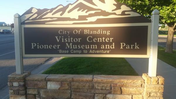 The Tesla chargers asre adjacent to Blanding's Visitor Center.