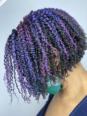 Rainbow colors on tight curly bob