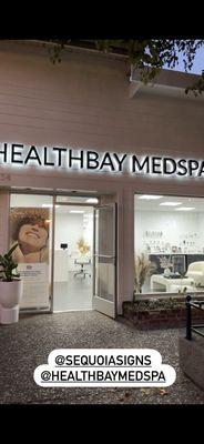 HealthBay Medspa sign at night!