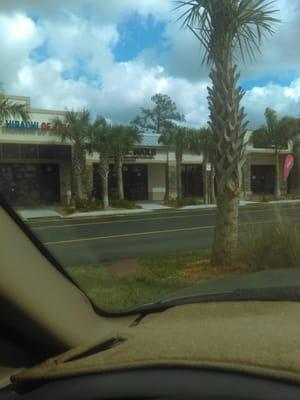 The strip mall right on the corner of radio road and santa barbara blvd