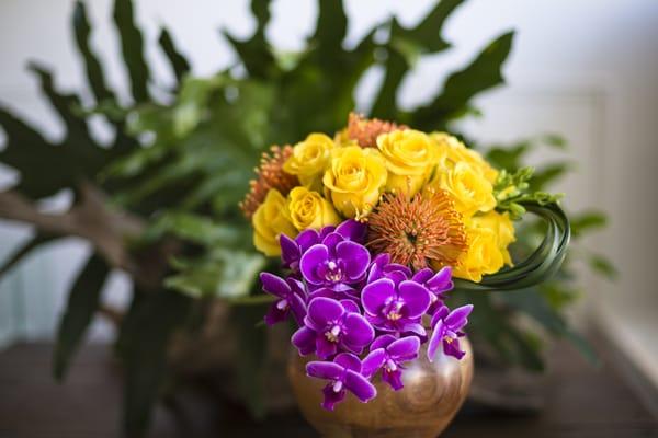 Tropicals-love!  The trick is to edit for impact. This arrangement was featured in Greenwich Magazine's wedding section