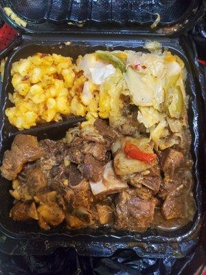 Curry goat, mac n cheese and cabbage was so good!!