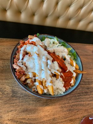 Chicken Gyro Bowl - came soaked in a red sauce that is very spicy.