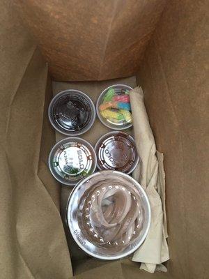 How your order is presented when complete. All toppings in small cups.