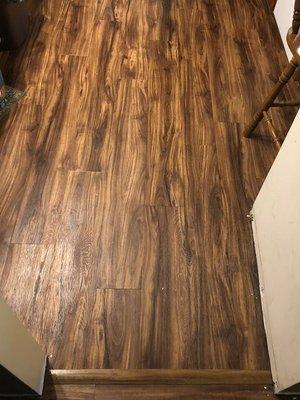 New Acacia vinyl plank floor installation.