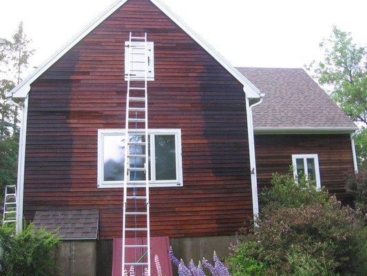 Pressure Washing house before being stained