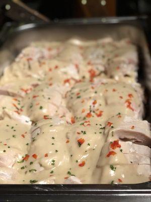 Chicken stuffed with Gouda, prosciutto, topped with brandy bechamel!