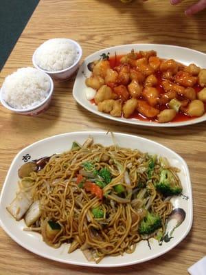 Sweet & sour chicken and Vegetable lo mein both served with white rice.