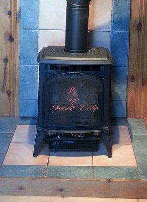 Quadrafire Sapphire gas stove in classic black cast iron installed by Wizard's locally in Flagstaff.