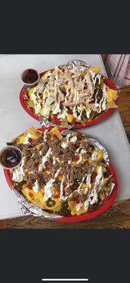 Loaded nachos with pork and smoked pulled chicken.