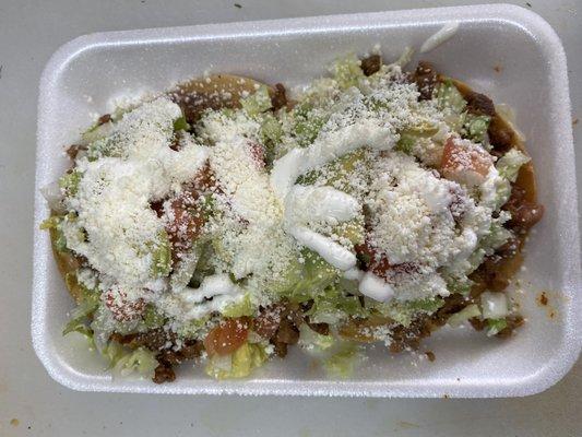 Tostadas (with your choice of meat) 
 
Crunchy shell with beans, lettuce, tomatoes, avocado, sour cream and cheese