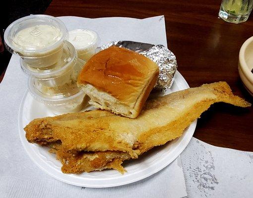 Bone in catfish with baked potato.