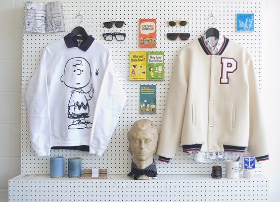 A wall celebrating the collaboration between designer Peter Jensen and Peanuts. also featured the Peanuts gang books and LA Eyeworks