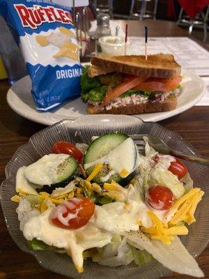 Side salad with blue cheese, chicken salad on grilled wheat bread, and chips for $9.00 Add a glass of wine for only $3!